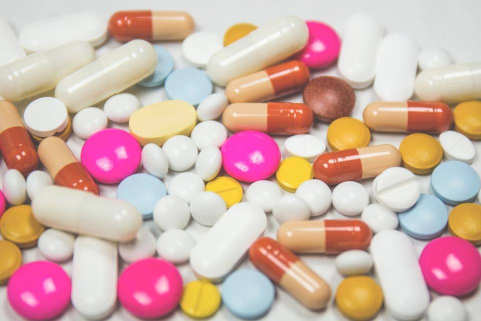 A pile of colorful pills and capsules